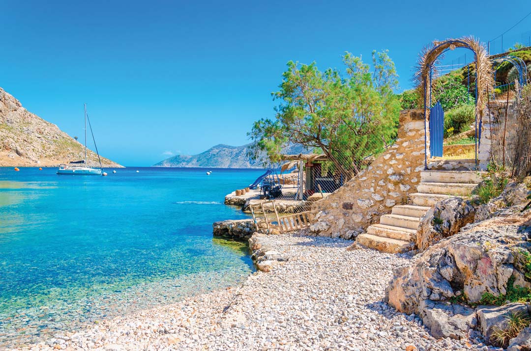 Stairs from sandy beach on Greece island Kalymnos